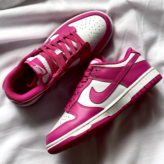 Pair of Nike Dunk Low Next Nature Hot Fuchsia sneakers