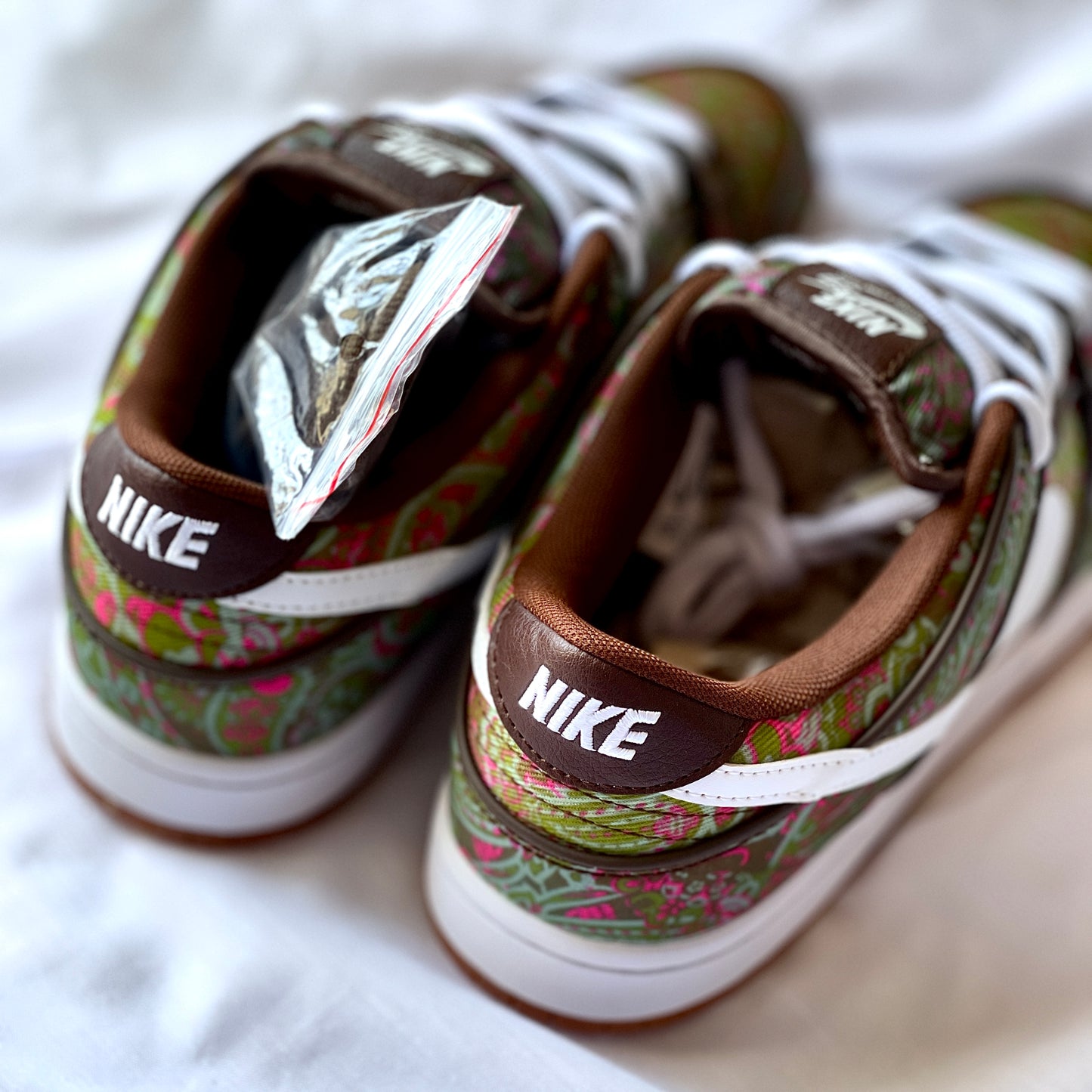 Heel stitching and branding detail on Dunk Low SB Paisley