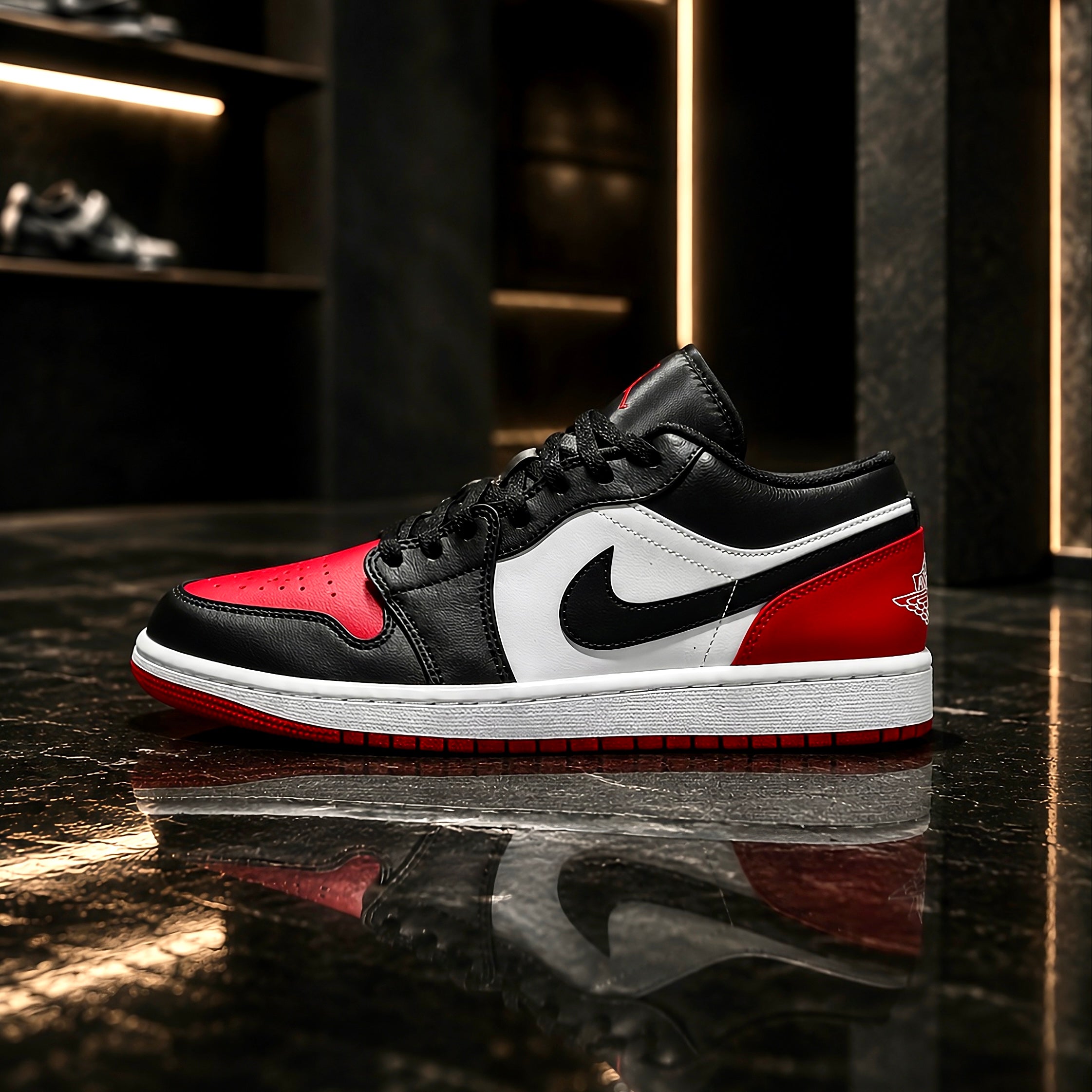 Air Jordan 1 Low Bred Toe side profile with black red and white leather upper