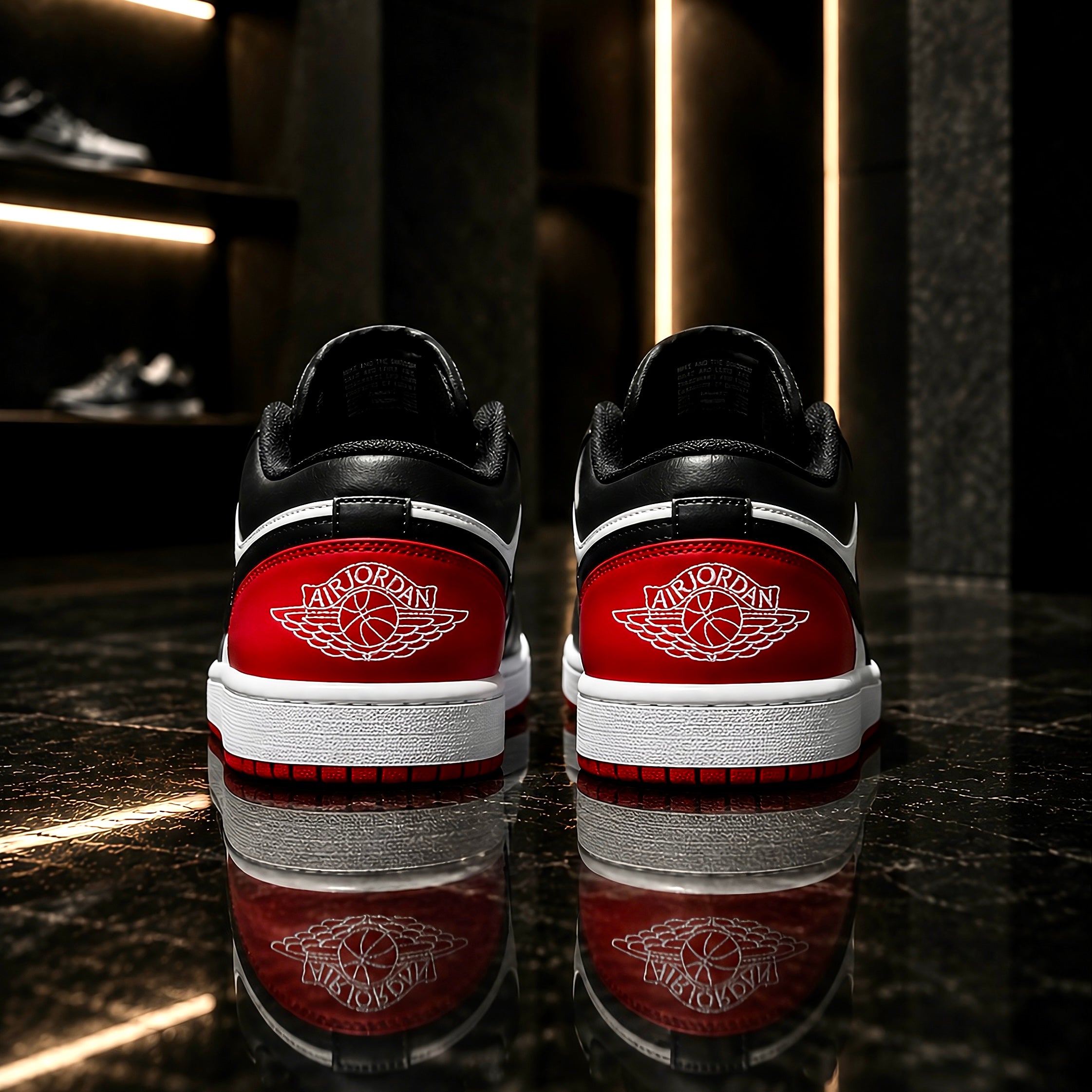 Air Jordan 1 Low Bred Toe heel view with embroidered Wings logo