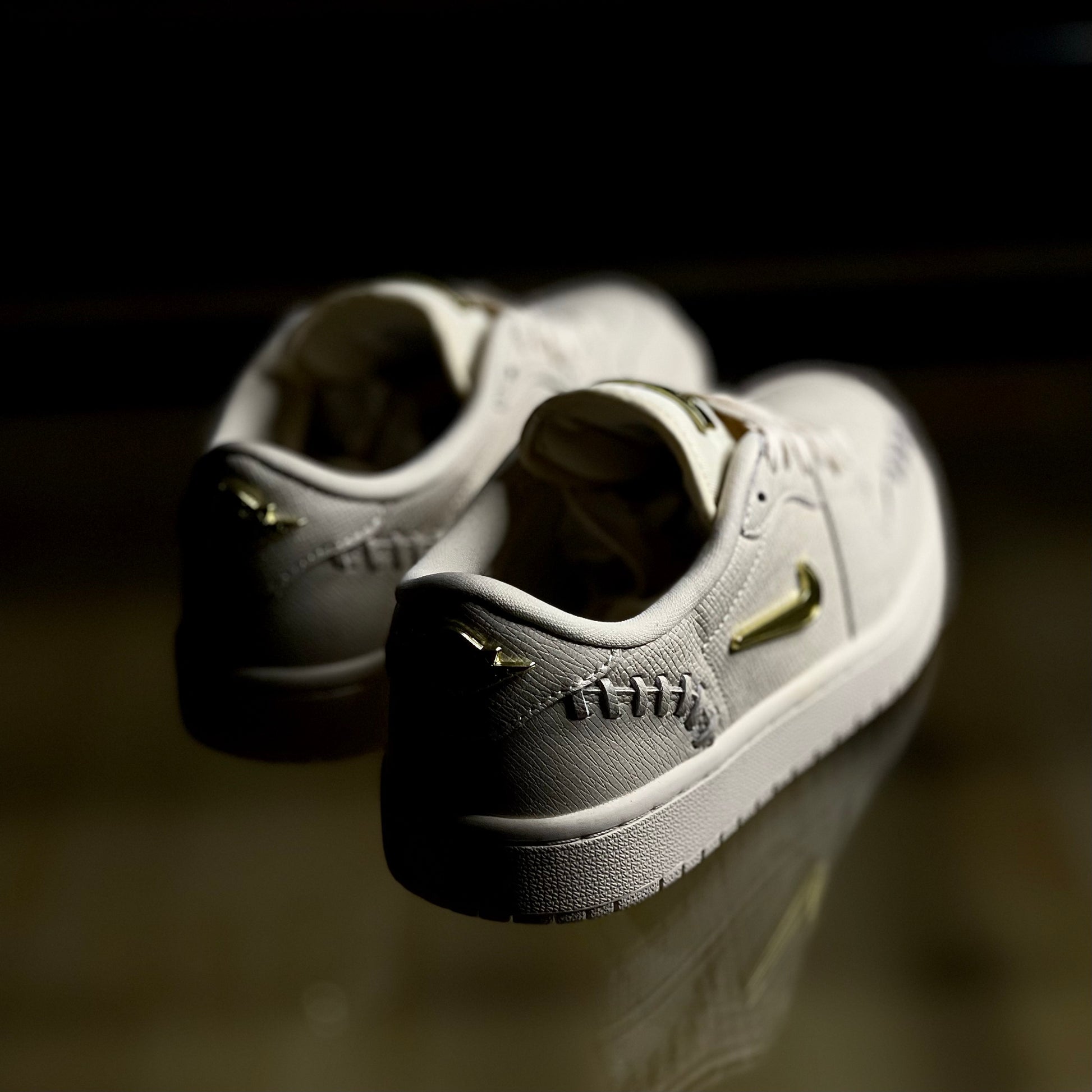 Back view of Air Jordan 1 Method of Make Light Legend Brown — heel panel stitching and embossed Air Jordan Wings logo