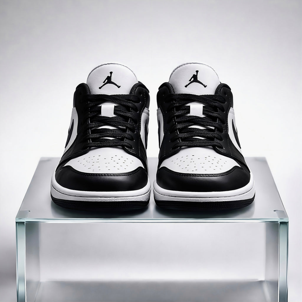 Air Jordan 1 Low front view featuring branding and AJ1 logo 