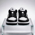 Air Jordan 1 Low front view featuring branding and AJ1 logo 