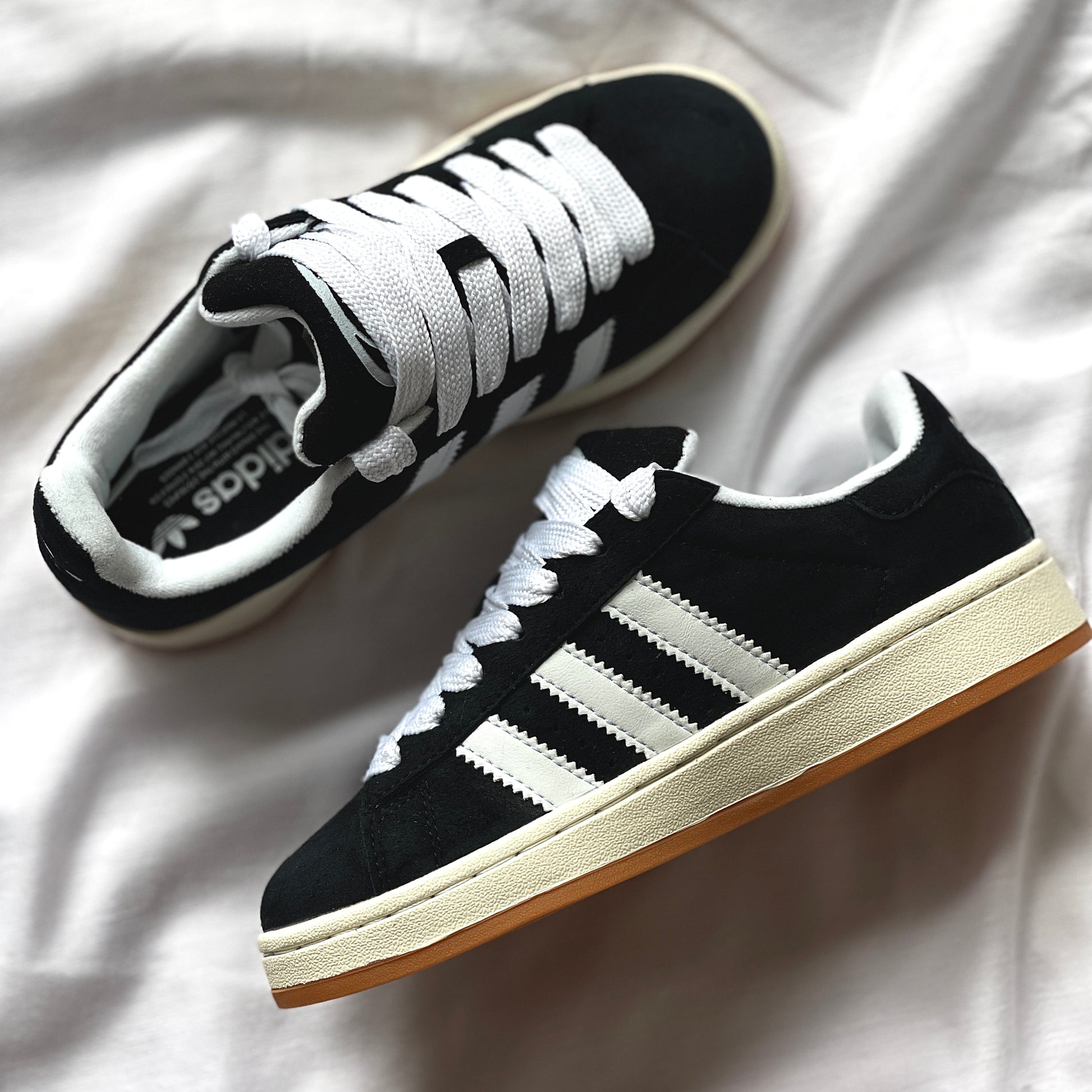 Close-up of black suede texture on adidas Campus