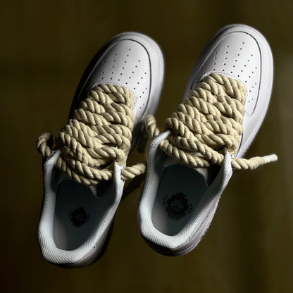 Top-down view of Nike Air Force 1 Low Triple White Rope Lace highlighting texture and craftsmanship