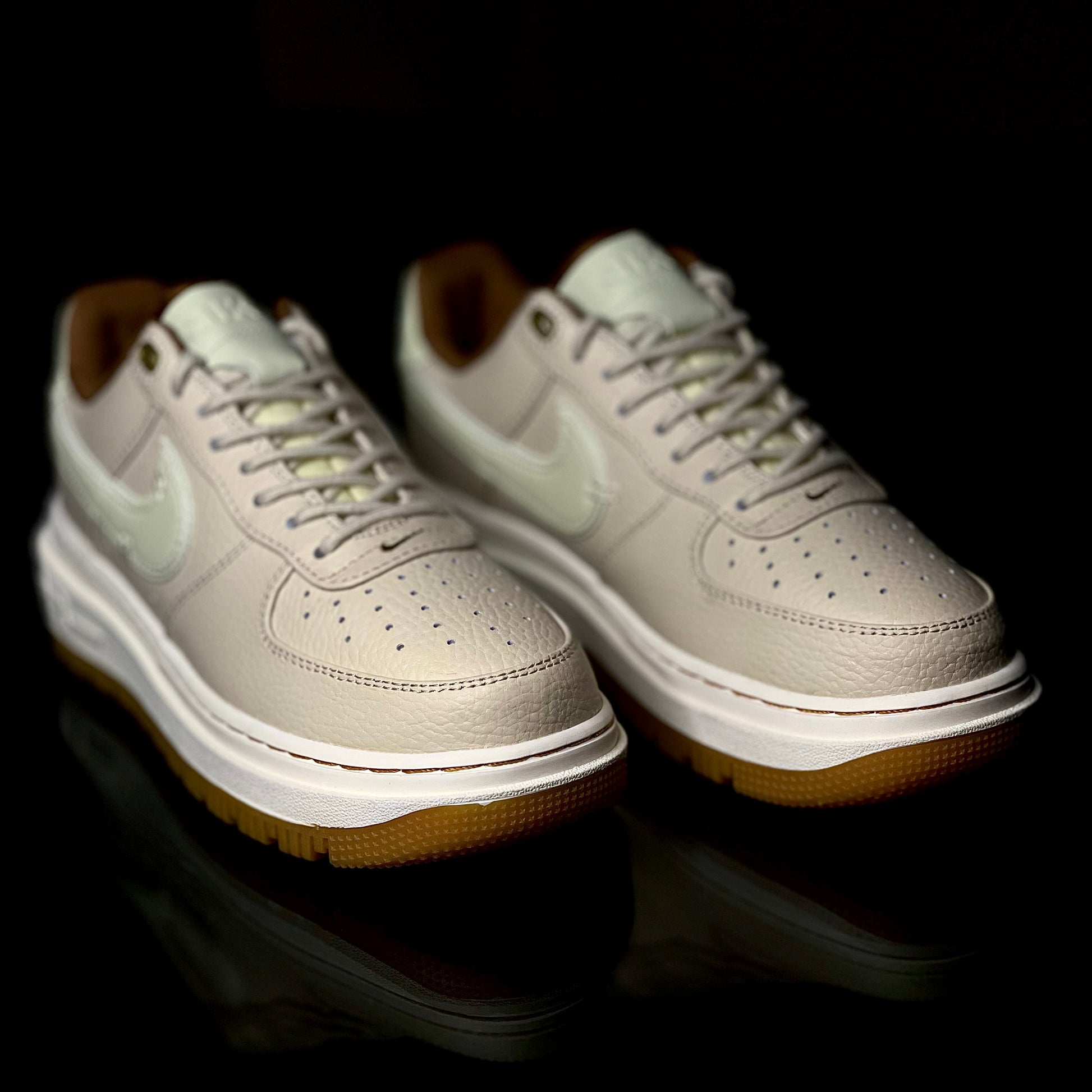 Close-up of Air Force 1 Luxe Pecan leather texture and craftsmanship — premium streetwear sneaker design