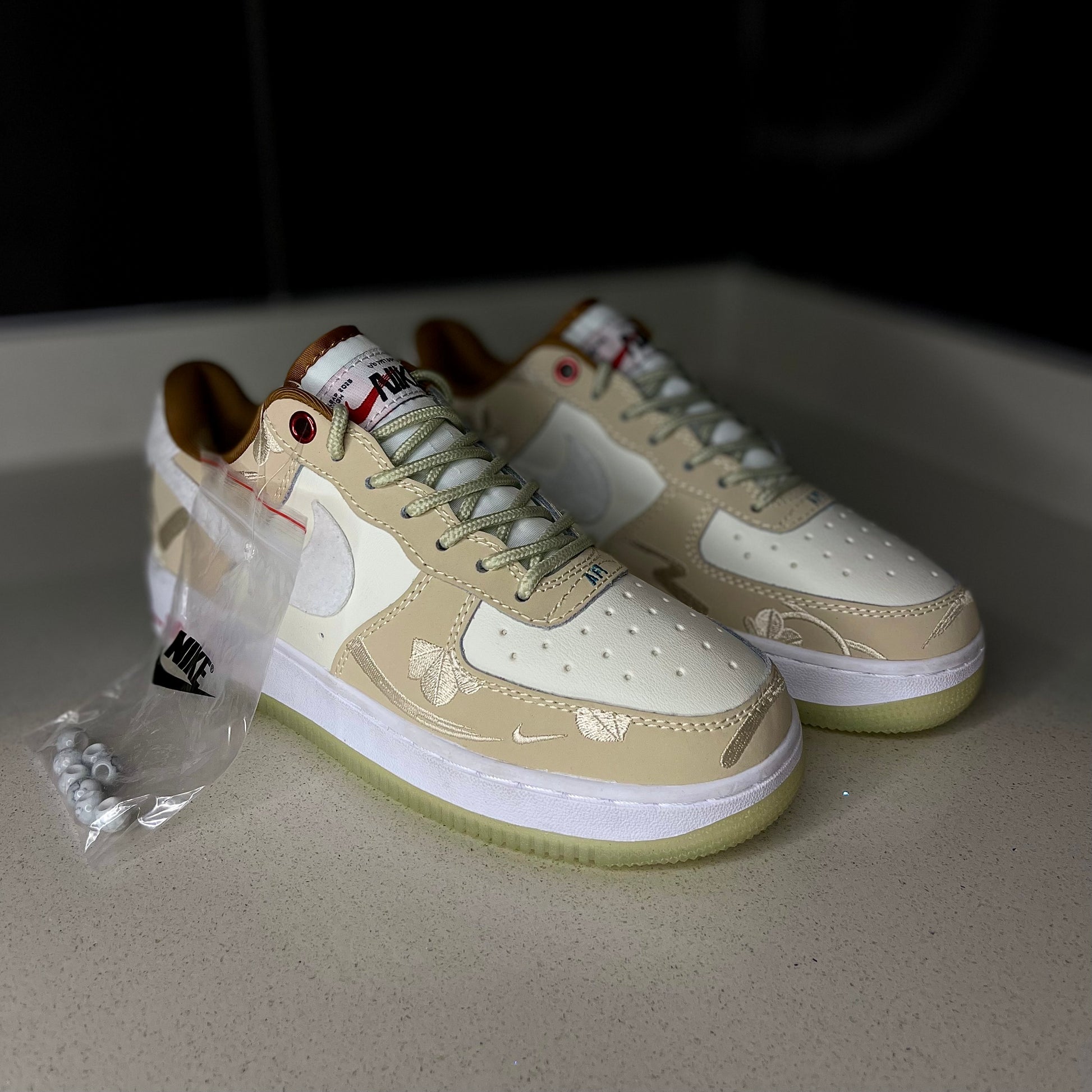 Angled view of Air Force 1 “Year of the Rabbit” — special edition sneaker with pastel colorway and rabbit motif