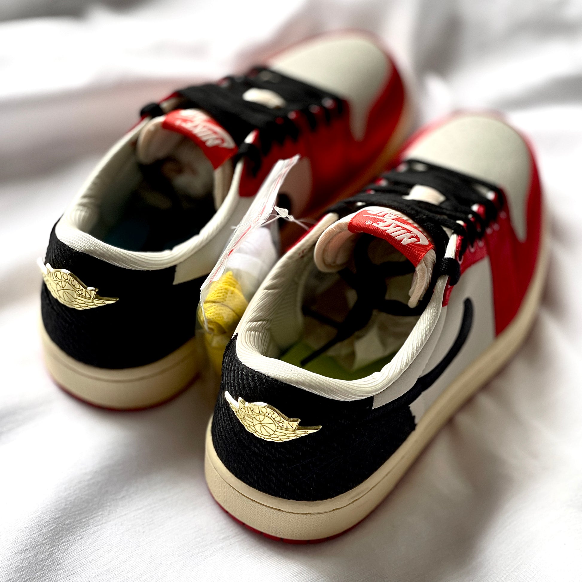 Heel detail with Trophy Room branding on Air Jordan 1 Low