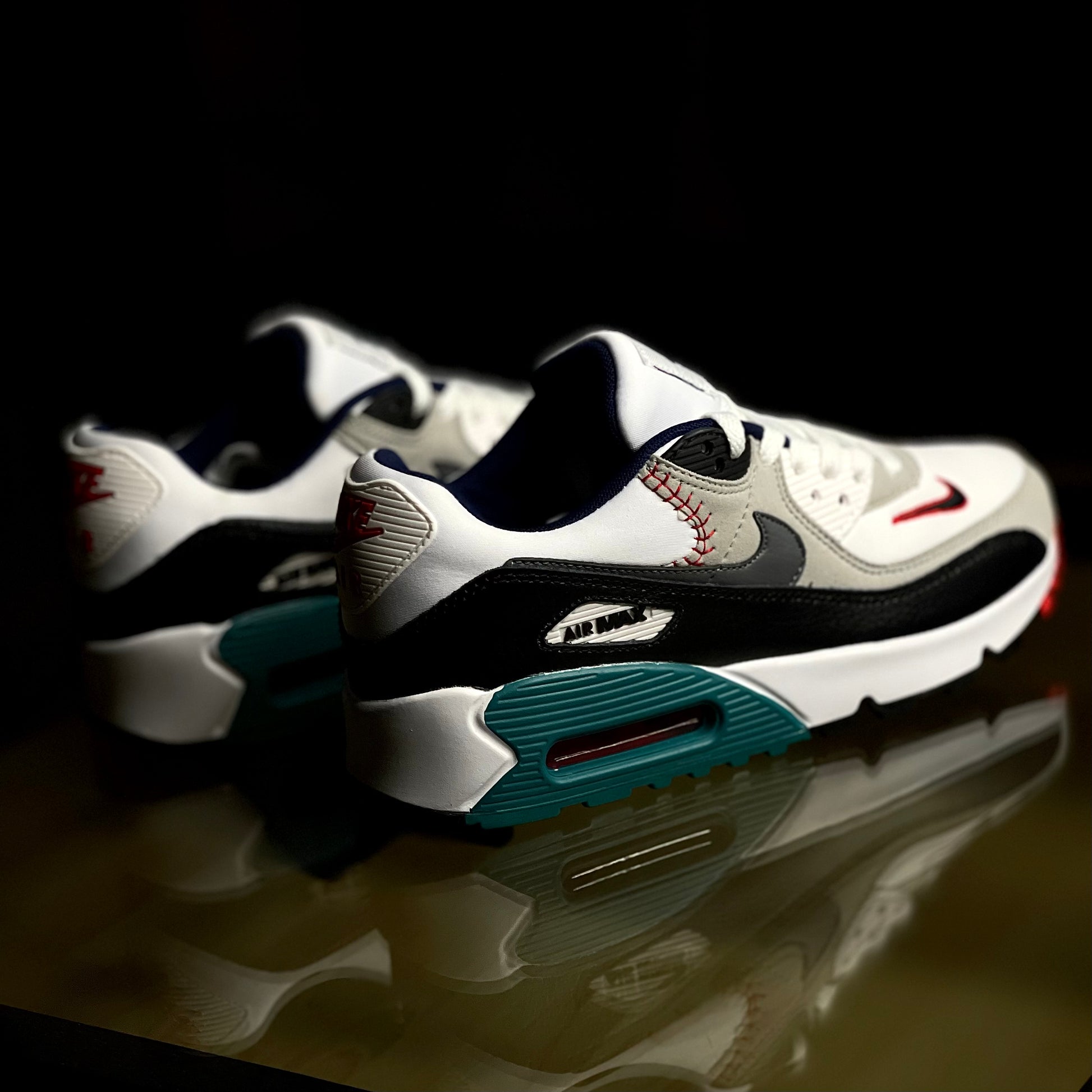 Angled view of Air Max 90 SE Running Club Deep Royal — retro-inspired blue sneaker with tan and red accent