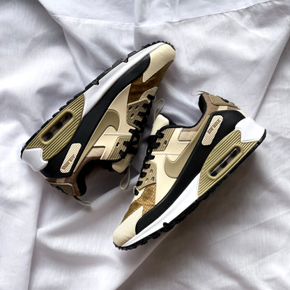 Detail shot of colour-blocked materials on Nike Air Max 90 Drift Light Orewood Brown