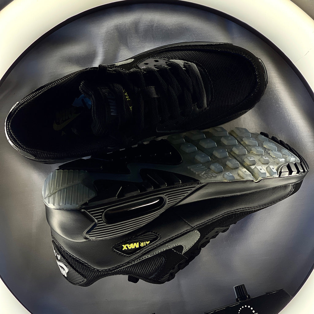 Outsole view of Nike Air Max 90 Halloween with translucent glow sole