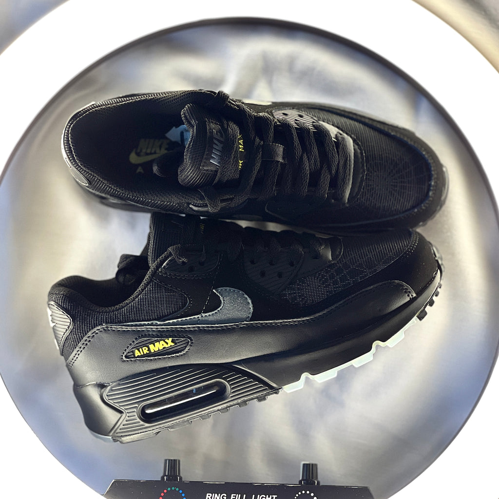 Nike Air Max 90 Halloween with black upper and orange detailing – side profile