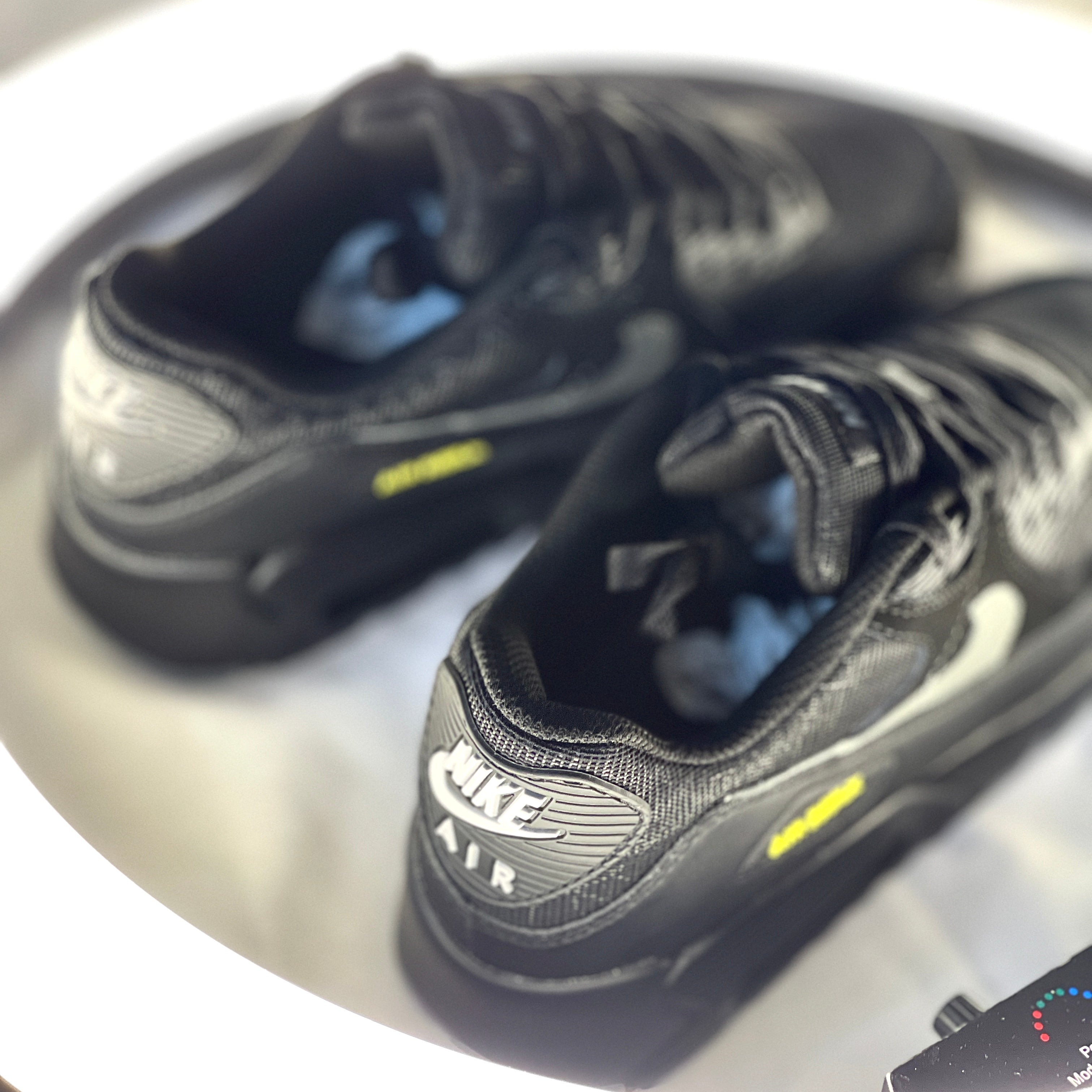 Rear view of Air Max 90 Halloween with orange heel tab and eerie detailing