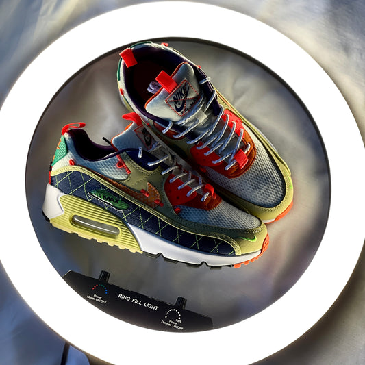 "Side profile of Nike Air Max 90 Mountaineering featuring mixed-material upper and visible Air unit"