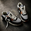 Patta x Nike Air Max 90 SP Black Particle Grey front three-quarter angle
