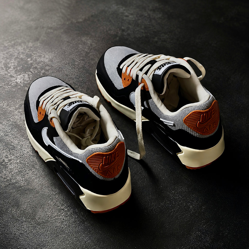 Heel view of Patta x Nike Air Max 90 SP Black Particle Grey