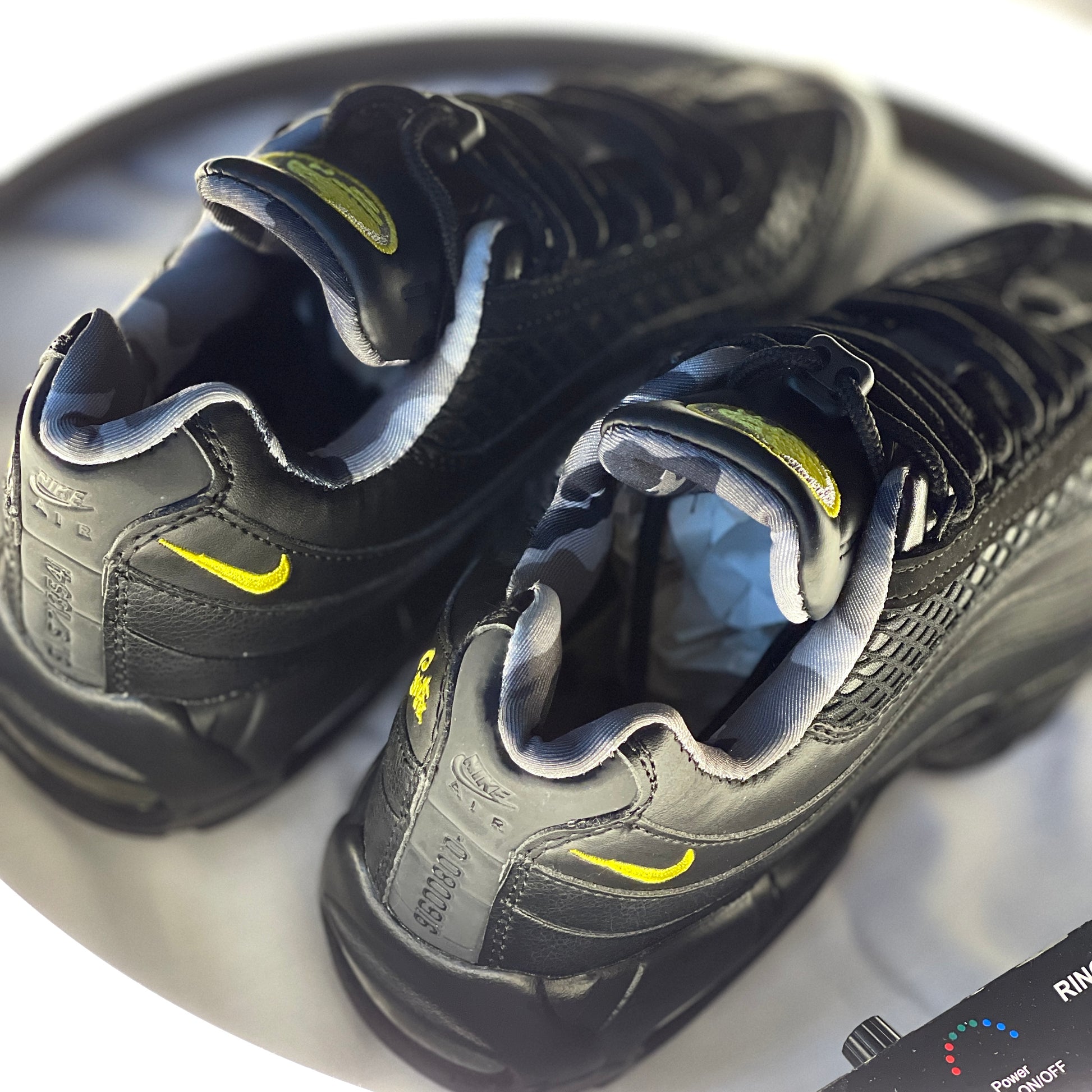 “Corteiz x Nike Air Max 95 SP ‘Honey Blacks’ heel and branding shot”