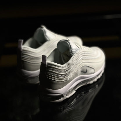 Back view of Nike Air Max 97 Triple White — heel tab with subtle branding and layered panel design