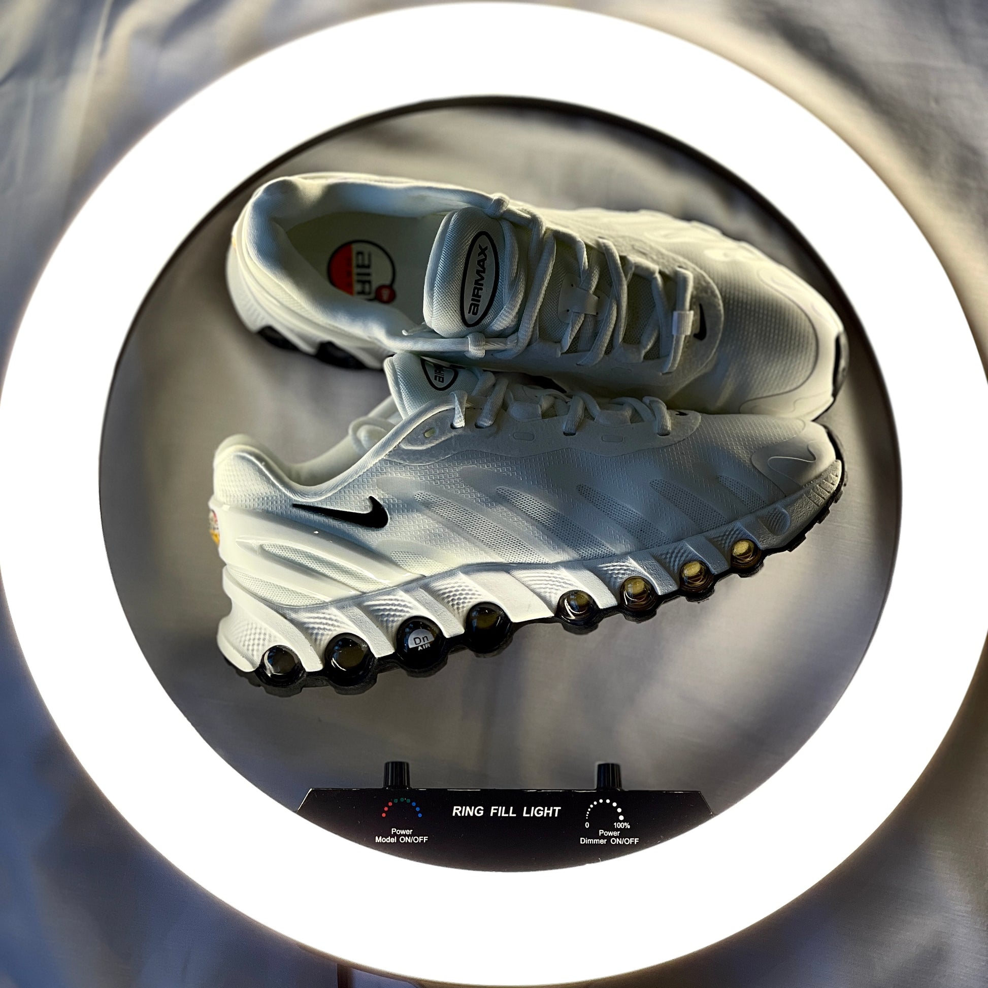 Close-up of breathable mesh and synthetic overlays on Air Max DN8