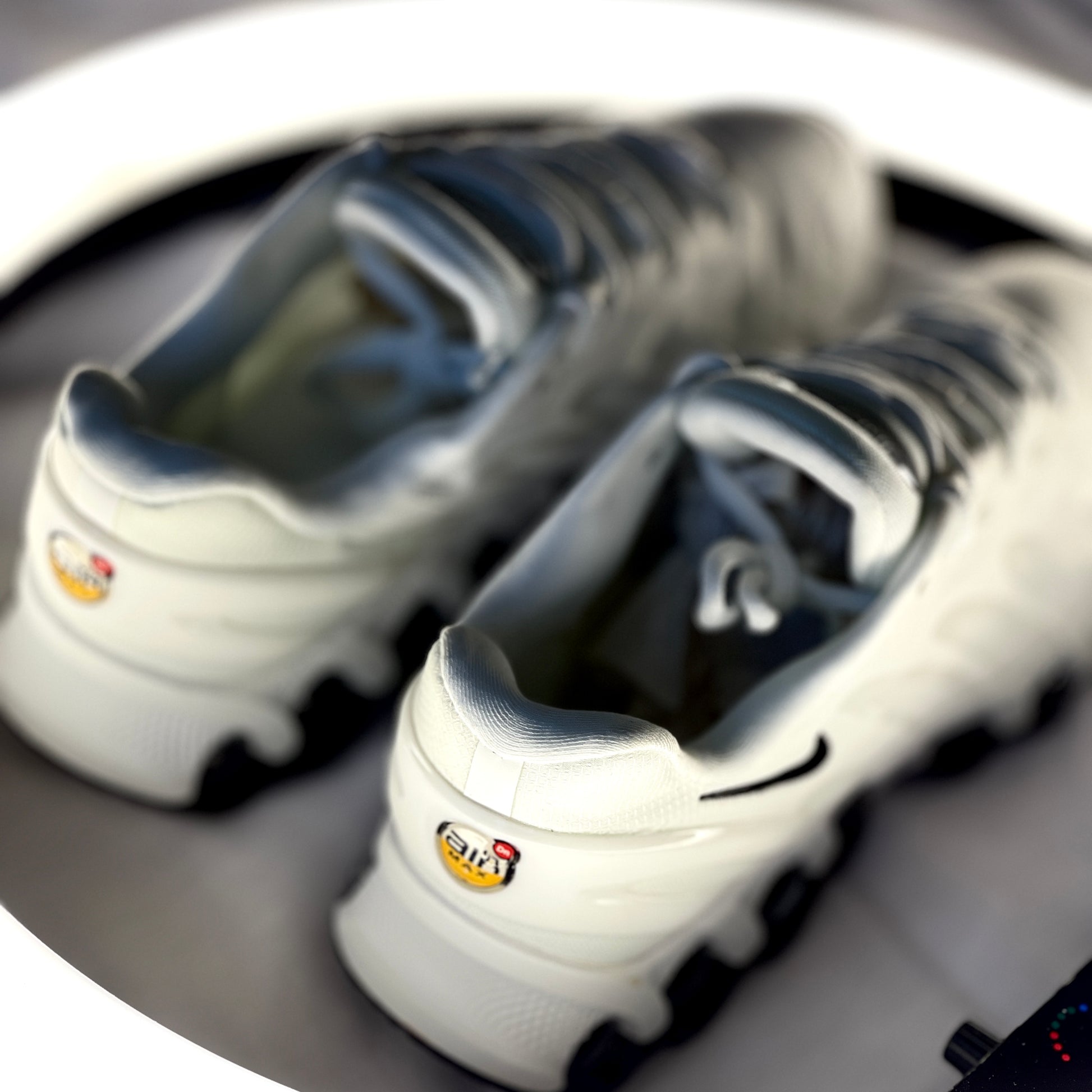 Heel view of Nike Air Max DN8 Pure Platinum Black