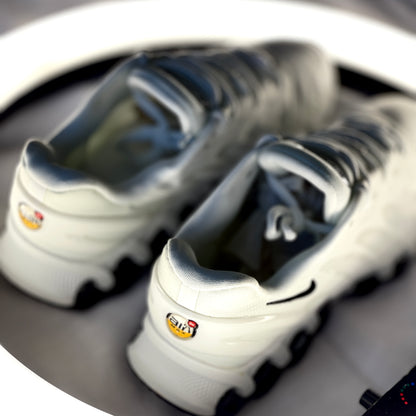 Heel view of Nike Air Max DN8 Pure Platinum Black