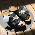 Birkenstock Arizona Sandal Birko-Flor Black side profile on table background