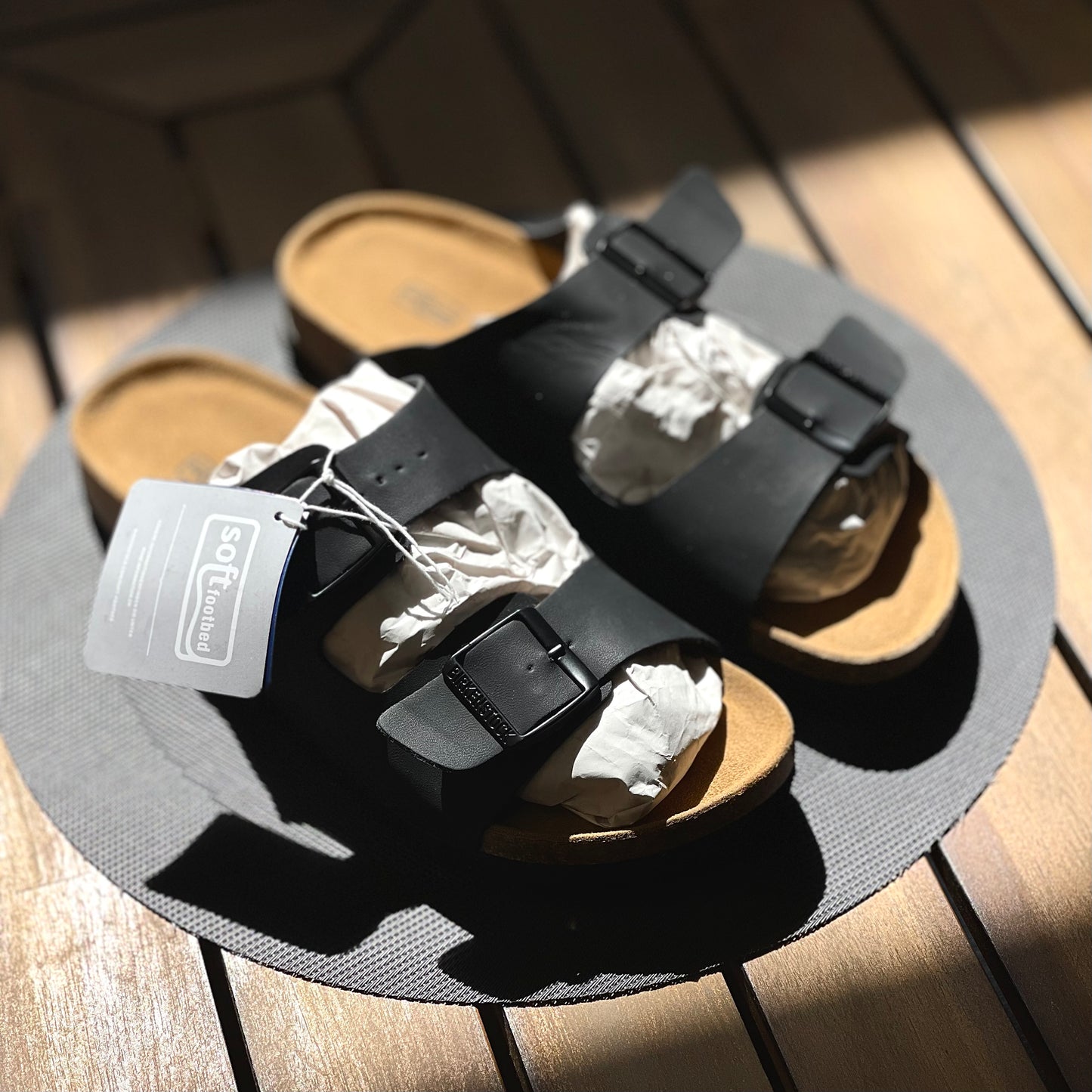 Birkenstock Arizona Sandal Birko-Flor Black side profile on table background