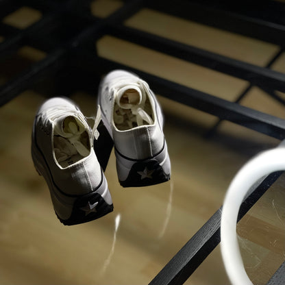 Back view of Converse Run Star Hike Low White — heel tab with embossed Converse logo and platform sole detail