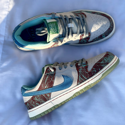 Close-up of green suede overlays on CSC Dunk Low SB