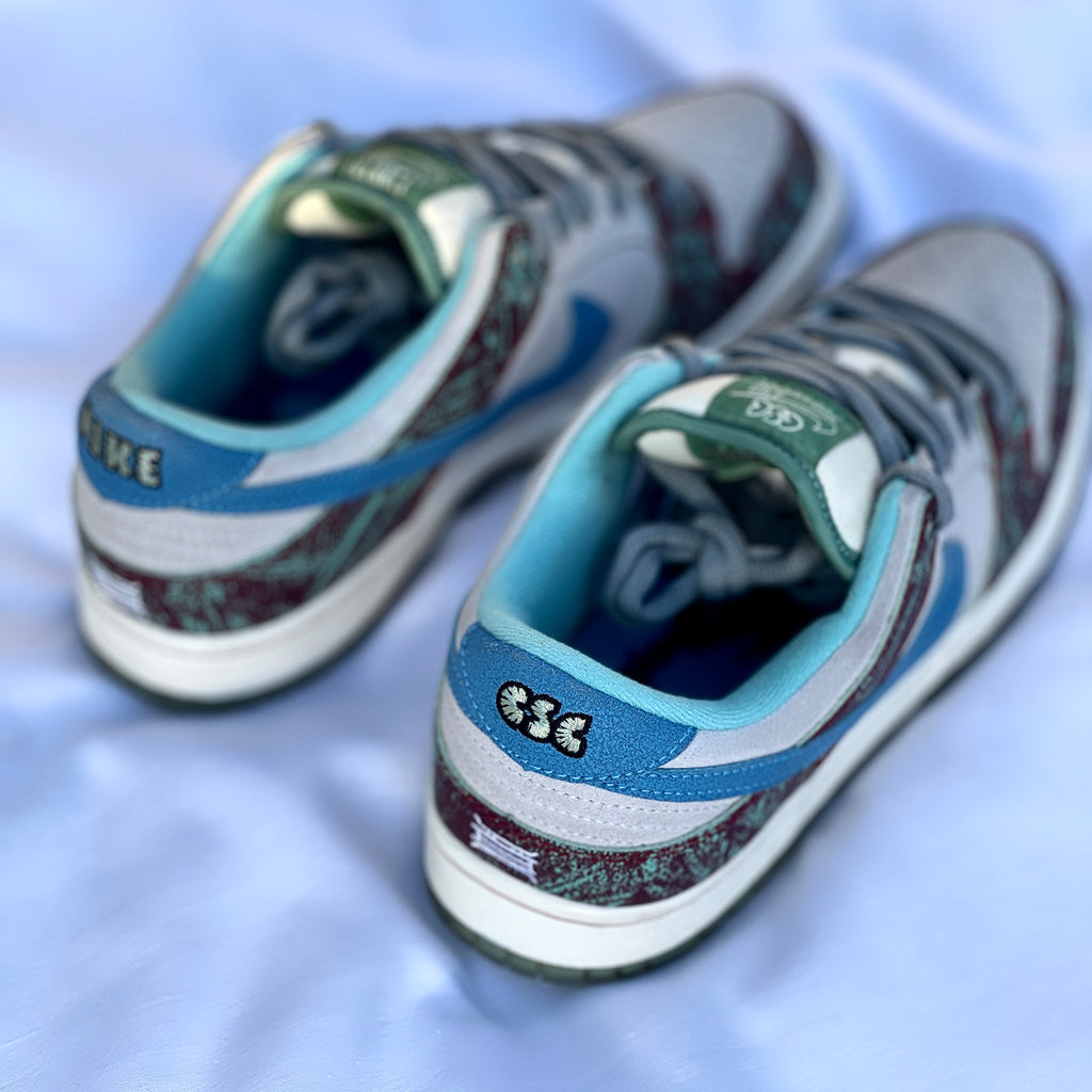 Heel branding detail on Crenshaw Skate Club x Dunk Low SB