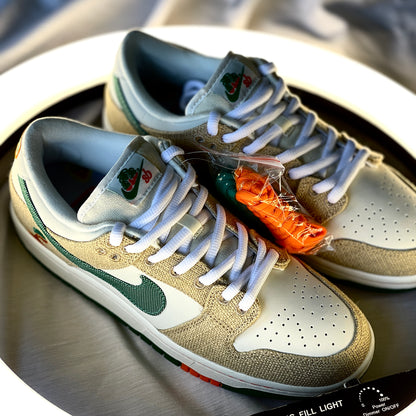 Nike Dunk Low SB Jarritos medial view with white leather, textured hemp overlays, and green swoosh.