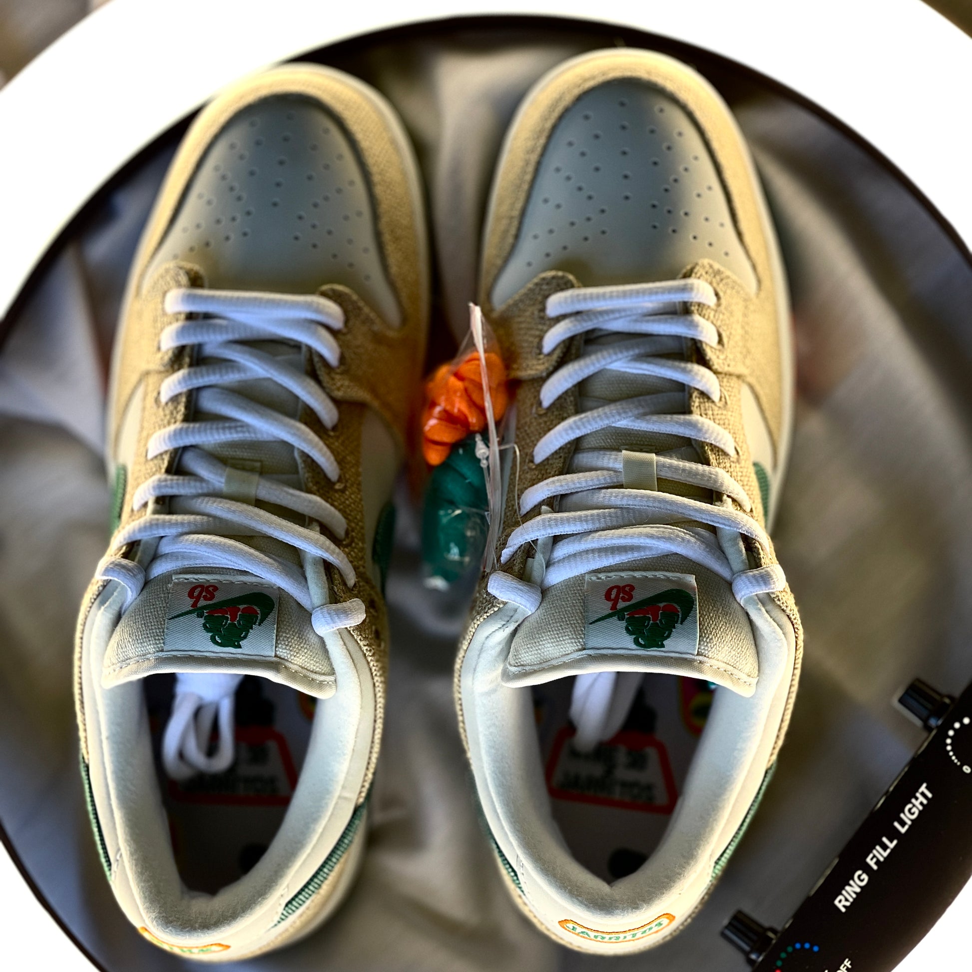 Top-down view of the Nike Dunk Low SB Jarritos showing laces, tongue tag, and colour-blocked overlays.