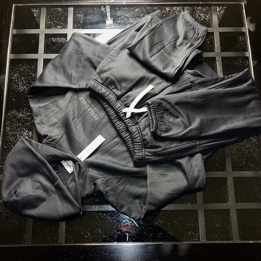 Essentials Fear of God Core Collection Black tracksuit full set front view on clean background