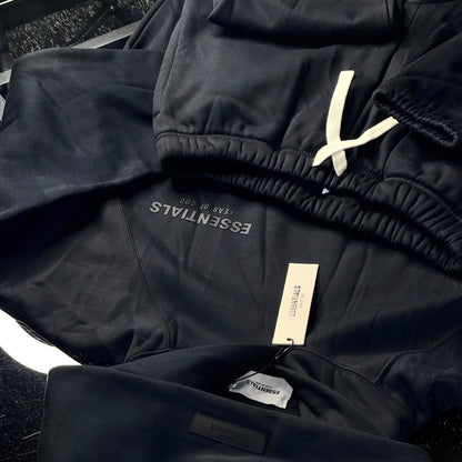 Close-up of Essentials Fear of God Core Collection Black sweatshirt with tonal logo detailing