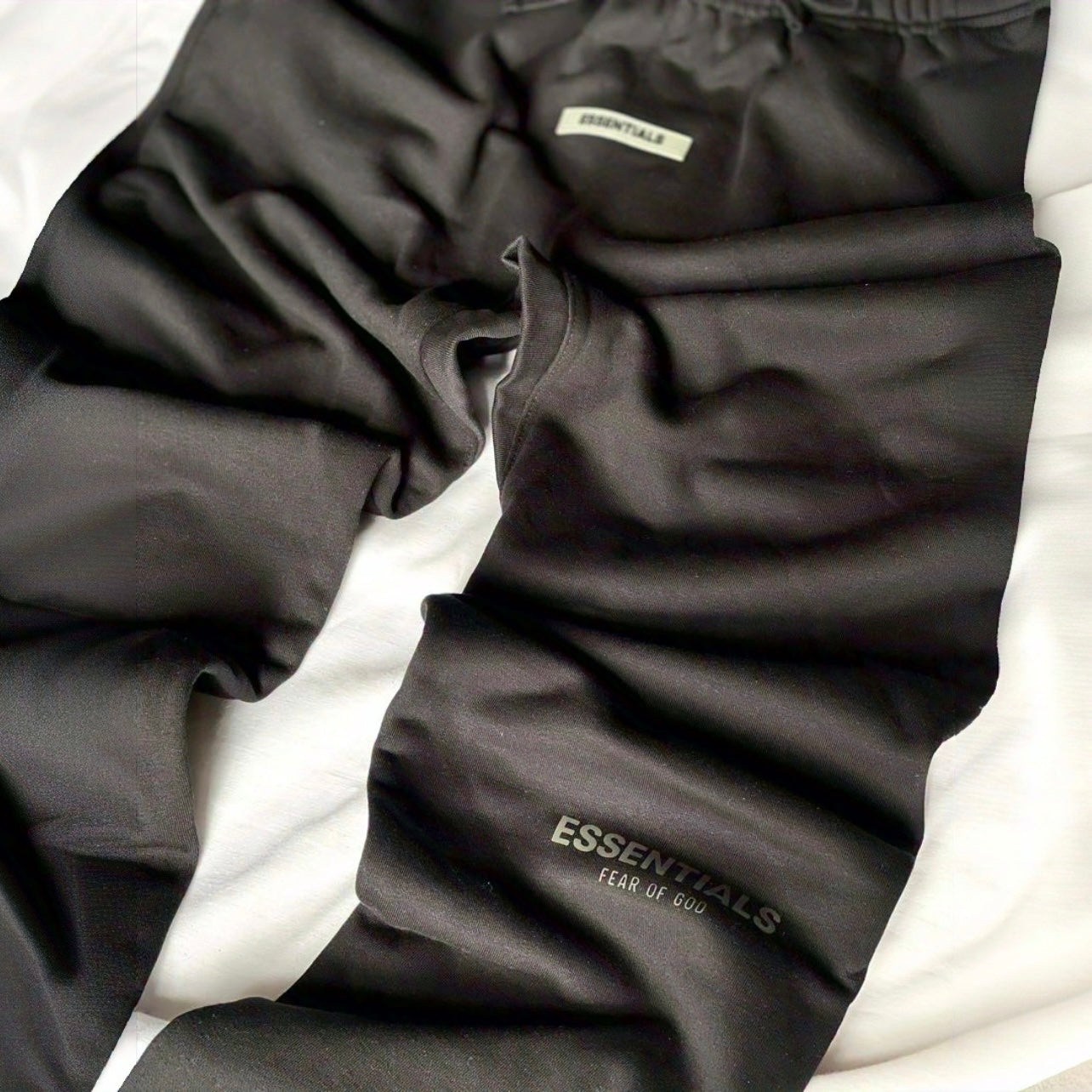 Detail shot of heavyweight fleece fabric on black Fear of God sweatpants