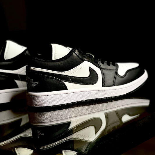 Air Jordan 1 Low Panda sneaker side profile on clean white background