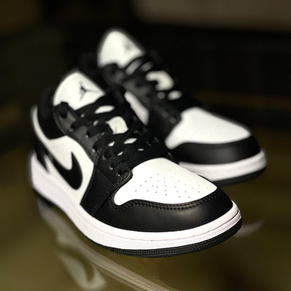 Close-up of Air Jordan 1 Low Panda leather upper with black overlays and white base