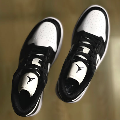 Top view of Air Jordan 1 Low Panda showing perforated toe box and lacing structure
