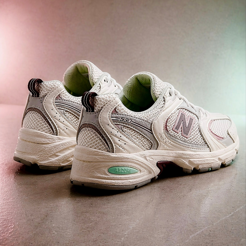 Heel view of New Balance 530 Sea Salt Ice Wine