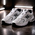 New Balance 530 White Black side profile sneaker