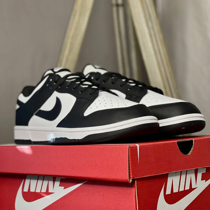 Close-up of Nike Dunk Low Panda leather texture and stitching details — premium low-top sneaker design