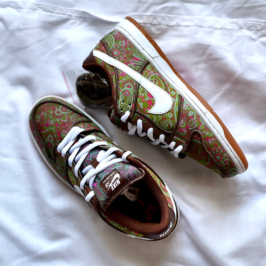 Pair of Nike Dunk Low Pro Premium SB Paisley sneakers angled together