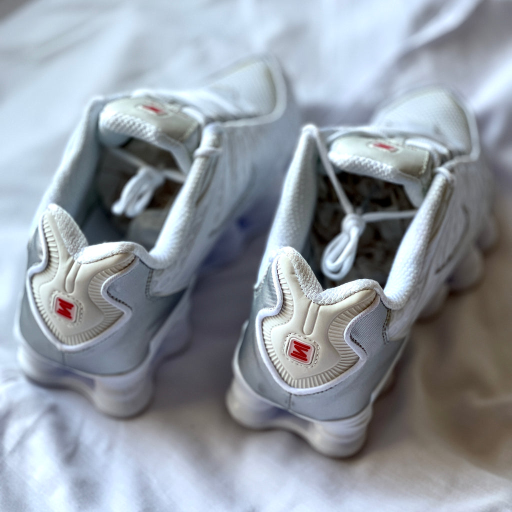 Heel view of Nike Shox TL Metallic Silver