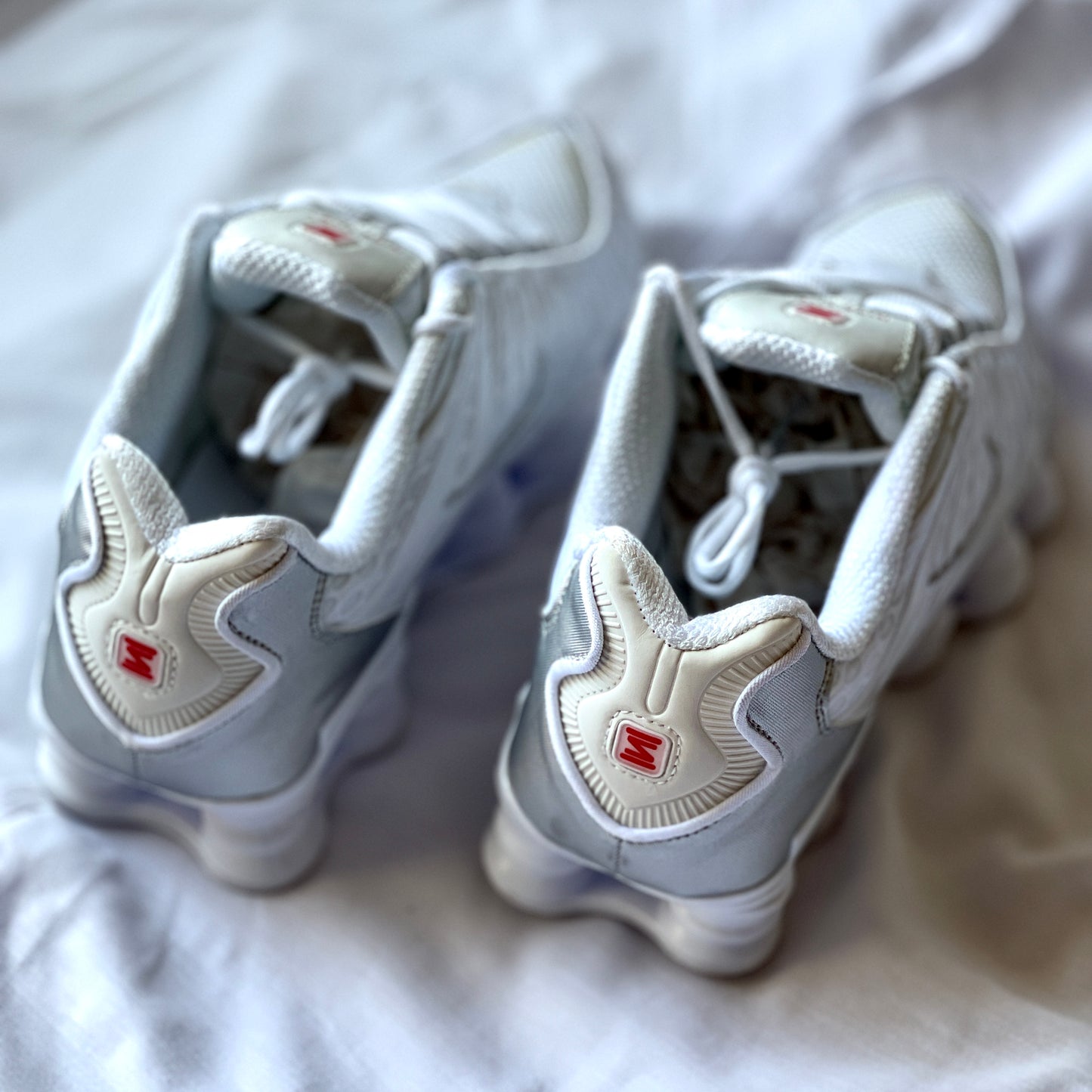 Heel view of Nike Shox TL Metallic Silver