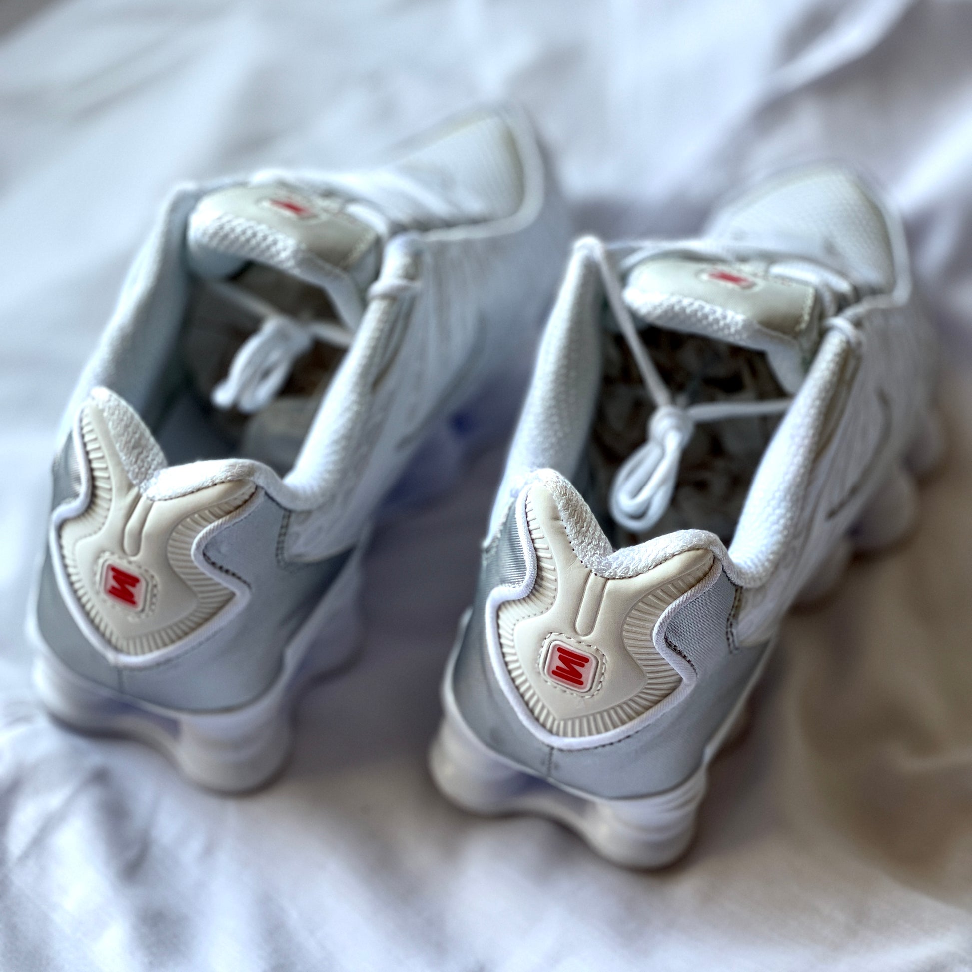 Heel view of Nike Shox TL Metallic Silver