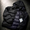 Open view showing inner lining on NOCTA Skulpeak jacket