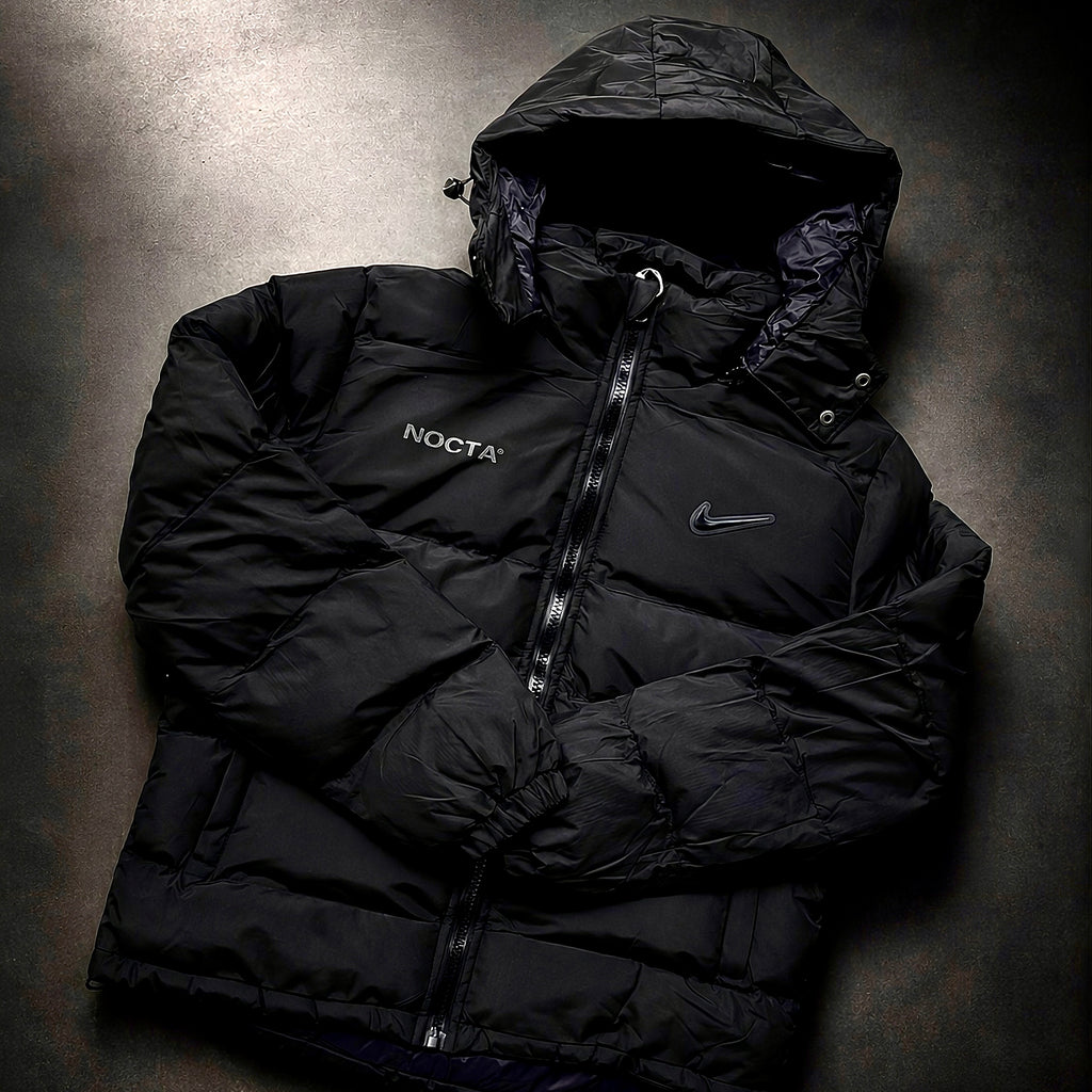Nike x Drake NOCTA Storm-FIT Skulpeak Puffer Jacket Black front view