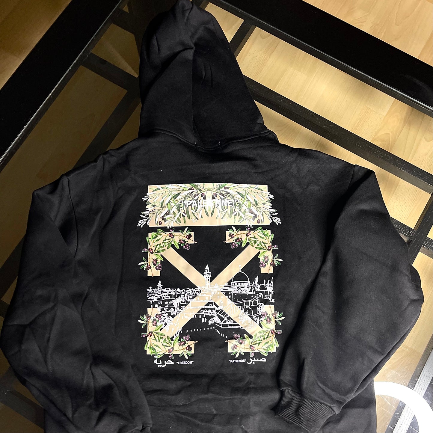 Back view of Off-White Inspired Palestine Hoodie Black — plain black back with relaxed fit and dropped shoulder seams